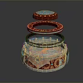 Stacked Circular Decorative Ornament With Red Blue Patterns And Layered Rings