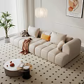 Beige Sectional Sofa With Pillows Throw Blanket Coffee Table And Green Plant In Living Room