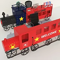 Red Train Shaped Reception Desk With Welcome Sign Computer And Plant