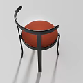 Modern Leisure Chair With Black Frame Orange Cushion And Curved Backrest Design