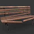 Worn Outdoor Bench With Damaged Wooden Planks Metal Legs And Green Graffiti