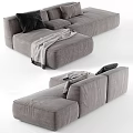 Modern Gray Sectional Sofa With Black Pillows And Draped Soft Blanket 3d model