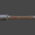 Ancient Weapon with Worn Metal Head and Textured Wooden Handle