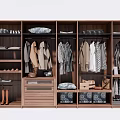 Modern Wooden Wardrobe Interior With Hanging Coats Shirts Shelves Drawers And Storage Boxes