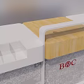 White Reception Desk With Wooden Top And BOC Logo On Glass Panels