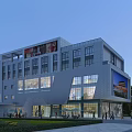 Modern Commercial Complex With Glass Facade Billboard Entrance And Pedestrian Landscaping
