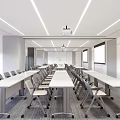 Modern Conference Room With Long Tables Chairs Projection Screens And Large Windows