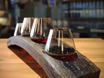 Wooden Arc Shaped Decorative Set With Transparent Glass Cups And Red Wine On Tabletop 3d model