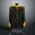Black military style jacket with yellow collar cuffs and gold buttons on display stand