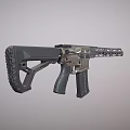 Black And Gold Tactical Rifle Featuring Long Rail Ergonomic Grip And Modern Stock Design