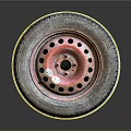 Worn Car Tire With Pink Hub And Black Holes On Textured Tread Surface