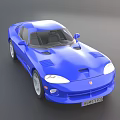 Blue Sports Car With Streamlined Design And Sleek Exterior Features