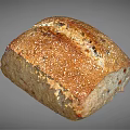 Freshly Baked Artisan Whole Grain Bread With Sesame Seeds And Crusty Texture
