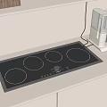 Modern Kitchen Appliances With Black Four Burner Induction Cooktop And White Coffee Maker On Countertop