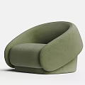 Green Velvet Single Seater Sofa With Curved Design And Modern Minimalist Style