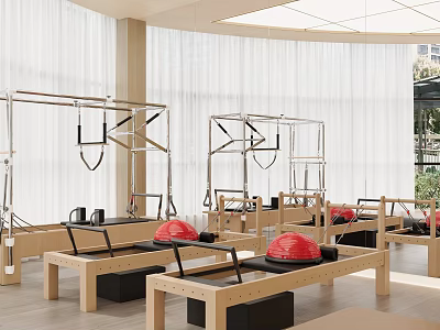 Bright Pilates Studio Interior With Wooden Reformers Red Exercise Balls And Cadillac Frames 3d model