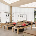 Bright Pilates Studio Interior With Wooden Reformers Red Exercise Balls And Cadillac Frames