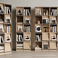 Modern Light Wooden Bookshelves With Books Photo Frames And Decorative Items