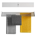 Colorful Towels Hanging On Modern Drying Rack