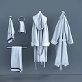 Cozy Bathrobes and Towels Hanging on Gray Background with Towel Ring Bar and Striped Details
