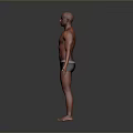 Bald Head Man Standing Shirtless In Dark Shorts On Gray Background