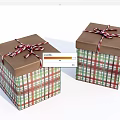 Two Decorative Gift Boxes With Red Green White Plaid Pattern And Ribbon Bow