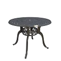 Stylish Metal Outdoor Table with Perforated Round Top and Ornate Decorative Legs