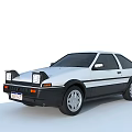 White Classic Two Door Car With Black Accents Square Headlights And Silver Wheels