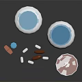 Assorted Food Supplement Bottles With Blue White Brown Pills And Labels