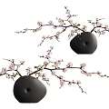 Decorative Black Ceramic Vase With Pink Blossoms Green Leaves And Slender Branches