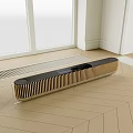 Sleek Black and Gold Soundbar with Striped Design on Light Wooden Floor and White Walls