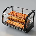 Multi Tiered Bakery Display Case with Donuts Croissants and Sesame Bread