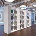 Modern Exhibition Hall With White Display Counter And Black Devices On World Map Wall