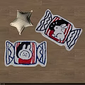 Cute Candy Shaped Rugs With Rabbit And Penguin Patterns Alongside Star Pillow On Wooden Floor