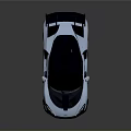 Silver Sleek Supercar With Black Roof Rear Spoiler And Red Alloy Wheels