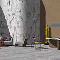 Gray Sofa and Coffee Table Set With Marble Wall Yellow Sculpture and Green Plant