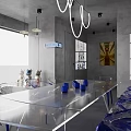 Modern Interior Space Featuring Transparent Chairs Blue Bases White Table Collectible Figures And Pendant Lights