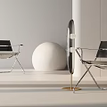 Modern Leisure Chair With Metal Frame And Sleek Design Alongside Floor Lamp In Minimalist Interior