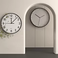 Two Round Wall Clocks with White Dial Black Hands on Light Colored Wall and Archway Interior Decor