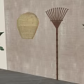 Natural Woven Basket and Bamboo Rake Tool as Indoor Wall Decor for Home Living