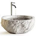 Natural Stone Washbasin With Rough Surface Texture Faucet Flowing Water And Small Stone Basin Design