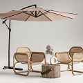 Outdoor Table Set With Wicker Chairs Umbrella And Decorative Vase