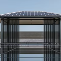 Modern Pavilion With Solar Panel Roof Vertical Black Columns And Reflective Floor Against Blue Sky