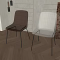 Modern Metallic Dining Chairs With Black Metal Legs On Wooden Floor And Green Plant