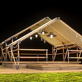 Outdoor Canopy With Wooden Frame White Canvas Roof And String Lights On Grassy Platform