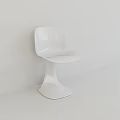 White Modern Single Chair With Sleek Surface And Flared Base Against Wall