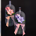 Hanging Glass Tag Vase Flowers with Pink Purple Blooms and Decorative Pink Bows