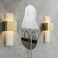 Modern Gold And White Wall Sconces With Sleek Design Mounted On Gray Tile Wall