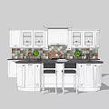 White Kitchen Cabinets With Black Countertop Colorful Tile Backsplash Island And Green Plants