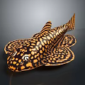 Black and orange spotted striped fish shaped decorative household item with vibrant pattern
